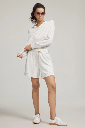 Emara women’s Crossover Hem Hoodie in soft Heather Mist Tencel™, modeled for fit and drape