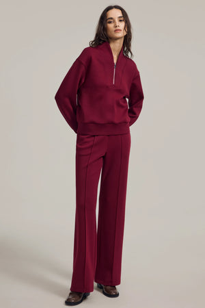 EMARA women’s burgundy wool-blend half-zip pullover, soft breathable knit, on model